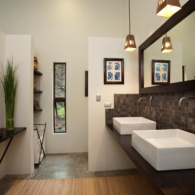 Bathroom - contemporary bathroom idea in Other with a vessel sink
