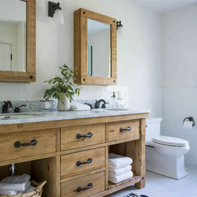 Example of a country master multicolored floor bathroom design in Burlington with flat-panel cabinets, medium tone wood cabinets and gray countertops