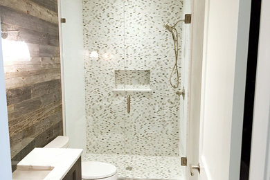 Inspiration for a mid-sized contemporary 3/4 white tile ceramic tile alcove shower remodel in Vancouver with shaker cabinets, brown cabinets, a one-piece toilet, gray walls, an undermount sink and marble countertops