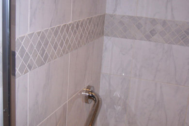 Inspiration for a gray tile and ceramic tile bathroom remodel in Portland Maine