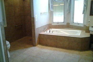 Mid-sized elegant master beige tile and ceramic tile ceramic tile bathroom photo in Other with a one-piece toilet and white walls