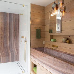 Large minimalist master white tile and ceramic tile porcelain tile walk-in shower photo in New York with a trough sink, flat-panel cabinets, light wood cabinets, onyx countertops, a one-piece toilet and multicolored walls