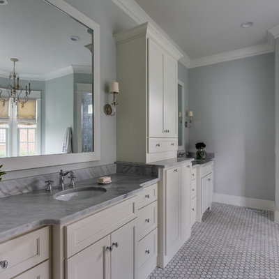 Example of a large classic master gray tile and mosaic tile mosaic tile floor bathroom design in Nashville with an undermount sink, white cabinets, marble countertops, green walls and recessed-panel cabinets