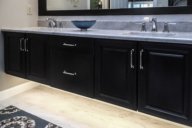 Bathroom - mid-sized traditional master marble floor and white floor bathroom idea in St Louis with black cabinets, gray walls, an undermount sink, quartzite countertops and a hinged shower door