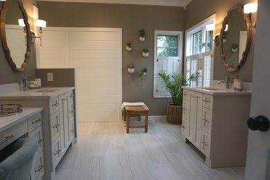 Mid-sized transitional master white tile ceramic tile and white floor bathroom photo in Other with shaker cabinets, white cabinets, a two-piece toilet, white walls, an undermount sink and quartzite countertops