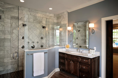 Inspiration for a large timeless master bathroom remodel in Columbus with an undermount sink, dark wood cabinets and gray walls