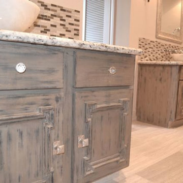 Chic Master Bathroom  - Antiqued Cabinets
