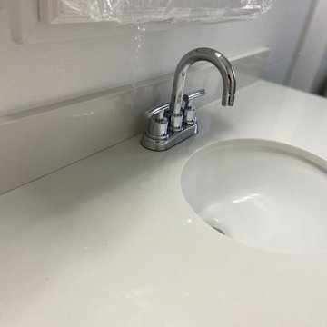 Chrome 4" Centerset faucet on an engineered Vanity Top
