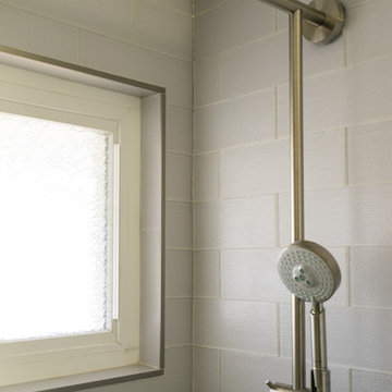 Rainfall Shower Head and Hand Shower Column in Bathroom Remodel