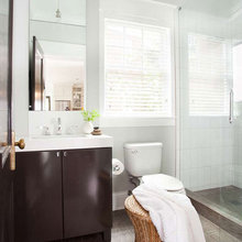 white bathrooms with wood floors