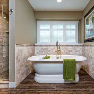 Mid-sized transitional master beige tile and travertine tile dark wood floor and brown floor bathroom photo in Detroit with an undermount sink, shaker cabinets, white cabinets, a one-piece toilet, beige walls, granite countertops and a hinged shower door