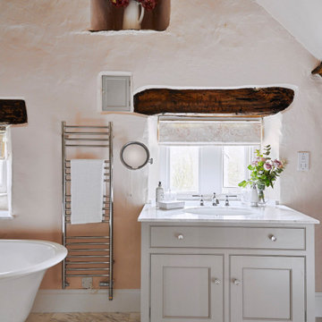 Classic Bathroom with Beam Detail by The Secret Drawer