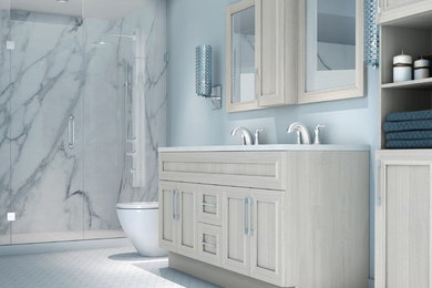Inspiration for a mid-sized modern master bathroom remodel in Toronto with shaker cabinets and light wood cabinets