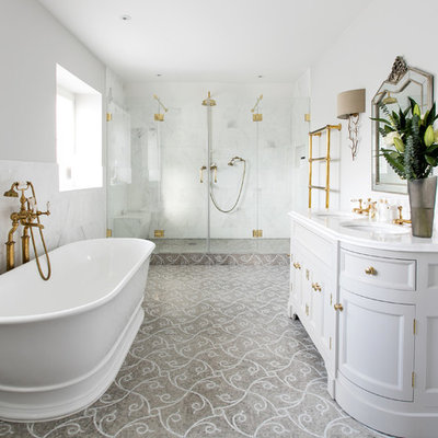 Large ornate master white tile and stone tile mosaic tile floor bathroom photo in Surrey with gray cabinets, gray walls, marble countertops, recessed-panel cabinets, an undermount sink and a hinged shower door