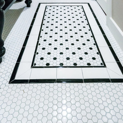 Example of a mid-sized classic master white tile and ceramic tile ceramic tile doorless shower design in Dallas with a console sink, flat-panel cabinets, black cabinets, marble countertops, a one-piece toilet and gray walls