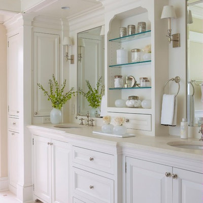 Inspiration for a timeless bathroom remodel in New York with raised-panel cabinets and white cabinets