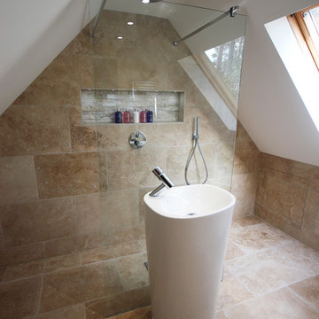 Classic loft batrhoom with linear shower and tumbled travertine tiles