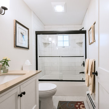 Classic white and tan Hall Bathroom