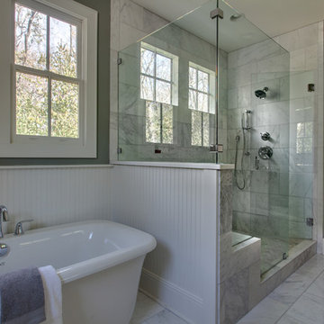 Classic White Marble Master Bath with Painted Beadboard Wainscot and Freestandin