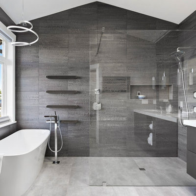 Inspiration for a large contemporary master gray tile, blue tile and porcelain tile porcelain tile and gray floor bathroom remodel in Seattle with flat-panel cabinets, black cabinets, gray walls, an undermount sink, quartz countertops and white countertops
