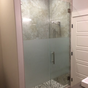 Clear frameless shower with privacy band