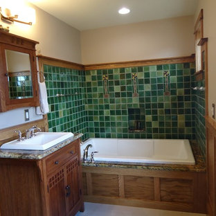 Inspiration for a large craftsman master green tile and ceramic tile ceramic tile bathroom remodel in Philadelphia with shaker cabinets, light wood cabinets, a one-piece toilet, multicolored walls, a drop-in sink and granite countertops