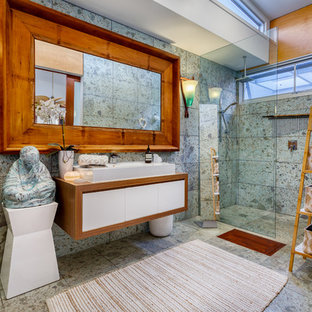Inspiration for an asian master bathroom in Brisbane with light wood cabinets.