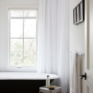Example of a danish 3/4 porcelain tile bathroom design in Austin with marble countertops and a one-piece toilet
