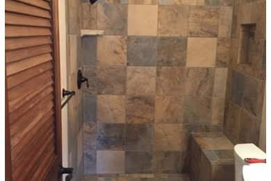 Mid-sized elegant 3/4 brown tile and ceramic tile slate floor and multicolored floor doorless shower photo in Salt Lake City with furniture-like cabinets and beige walls