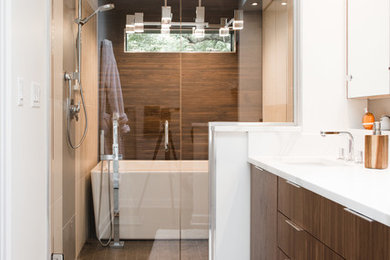 Inspiration for a mid-sized contemporary 3/4 brown tile and porcelain tile porcelain tile and brown floor bathroom remodel in Other with flat-panel cabinets, dark wood cabinets, white walls, an undermount sink, solid surface countertops and a hinged shower door