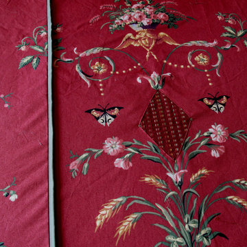 Close up of Red coverlet.