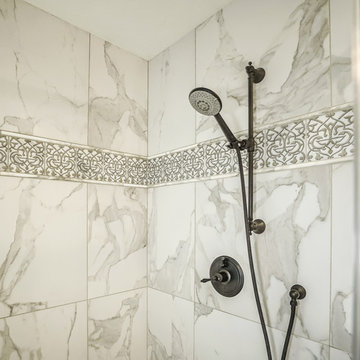 Close Up - Shower Tile & Faucets.