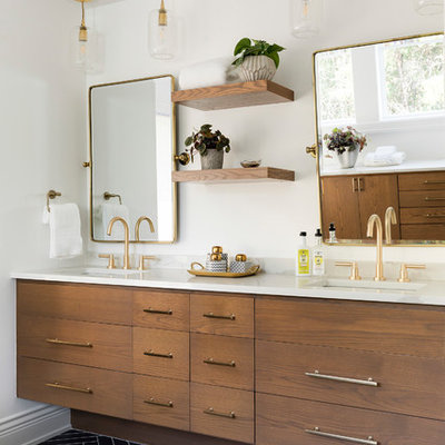 Example of a large beach style master ceramic tile and black floor bathroom design in Minneapolis with an undermount sink, quartzite countertops, white countertops, flat-panel cabinets, dark wood cabinets and white walls