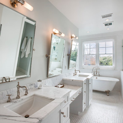 Inspiration for a timeless white tile and subway tile ceramic tile claw-foot bathtub remodel in Los Angeles with marble countertops, white walls, white cabinets, an undermount sink and recessed-panel cabinets