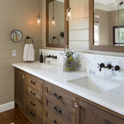 Bathroom - farmhouse white tile and stone tile bathroom idea in San Diego with dark wood cabinets, brown walls and white countertops