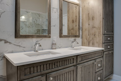 Transitional master bathroom photo in Philadelphia with beaded inset cabinets, an integrated sink and quartz countertops