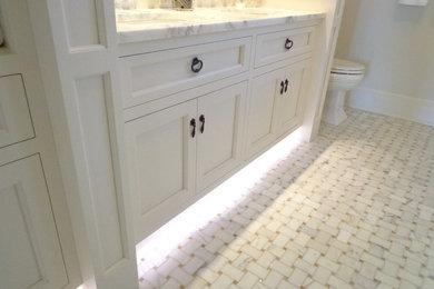 Bathroom - large traditional master linoleum floor bathroom idea in Los Angeles with shaker cabinets, white cabinets, a two-piece toilet, white walls, an undermount sink and marble countertops