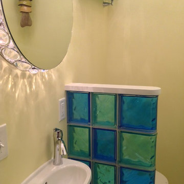 Colored glass block wall in a half bathroom Cleveland Heights Ohio