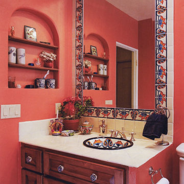 colorful Mexican tile surround the built-in mirror