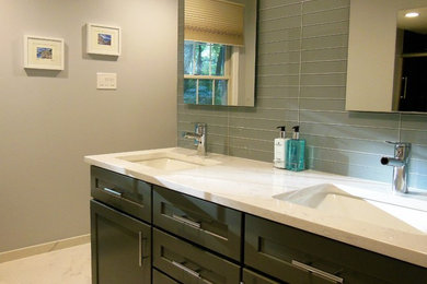 Inspiration for a contemporary master glass tile porcelain tile bathroom remodel in DC Metro with an undermount sink, quartzite countertops and white countertops