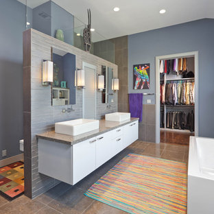 Bathroom - contemporary bathroom idea in Houston with a wall-mount toilet