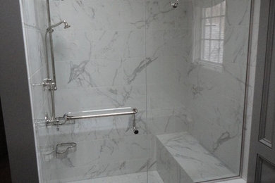 Transitional master white tile and porcelain tile medium tone wood floor alcove shower photo in Columbus with an undermount sink, beaded inset cabinets, gray cabinets, quartz countertops and gray walls