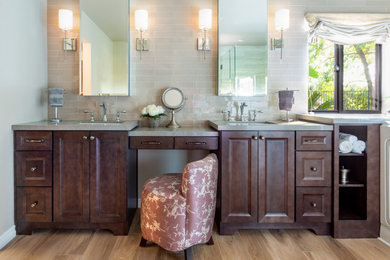 Bathroom - huge transitional master gray tile and subway tile porcelain tile, brown floor and double-sink bathroom idea in Los Angeles with recessed-panel cabinets, dark wood cabinets, gray walls, quartz countertops, gray countertops and a built-in vanity