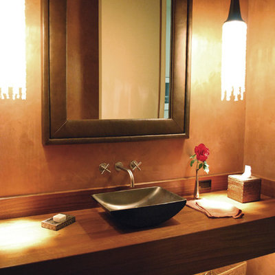 Bathroom - contemporary bathroom idea in San Francisco with a vessel sink and wood countertops
