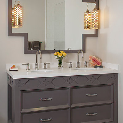 Trendy bathroom photo in San Francisco with an undermount sink, furniture-like cabinets, gray cabinets and white countertops