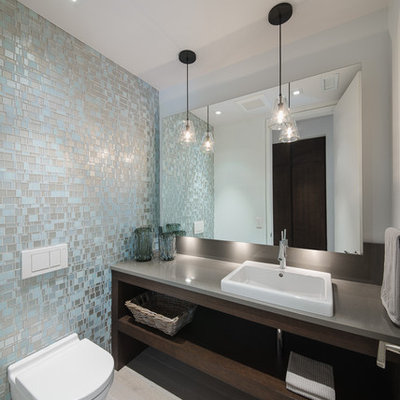 Inspiration for a contemporary bathroom remodel in Ottawa with a wall-mount toilet and gray countertops