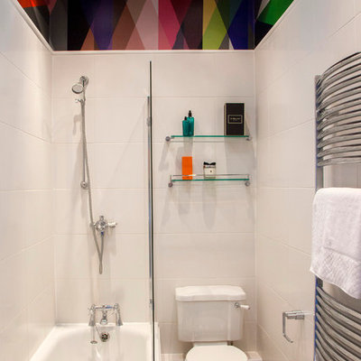 Bathroom - contemporary white tile bathroom idea in Other with a two-piece toilet