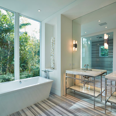 Inspiration for a large contemporary master bathroom remodel in Miami with a console sink