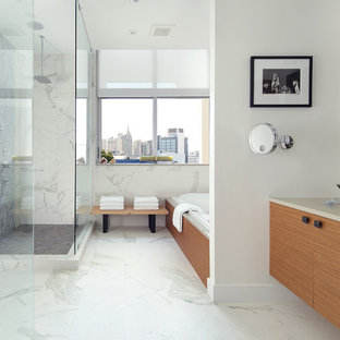 Large trendy master white tile and porcelain tile porcelain tile and white floor bathroom photo in Other with a vessel sink, flat-panel cabinets, light wood cabinets, quartz countertops, white walls, a one-piece toilet and a hinged shower door