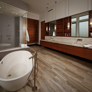 Trendy master beige tile bathroom photo in Houston with an undermount sink, flat-panel cabinets, dark wood cabinets and white walls